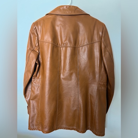 Is a light brown the leather shop sears jacket. 40 Regular - Picture 2 of 5
